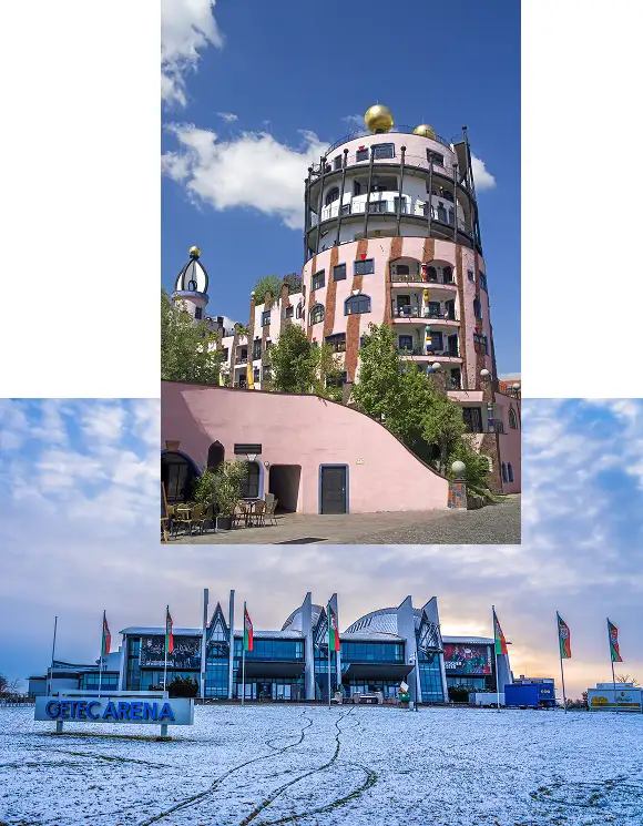 Verspieltes, buntes Gebäude mit goldenen Kuppeln und unregelmäßiger Fassade unter blauem Himmel, darunter moderne Mehrzweckarena im Schnee mit Fahnenreihe